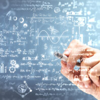 Male hand writing mathematical formulas on blurry background. Science and algebra concept. Double exposure